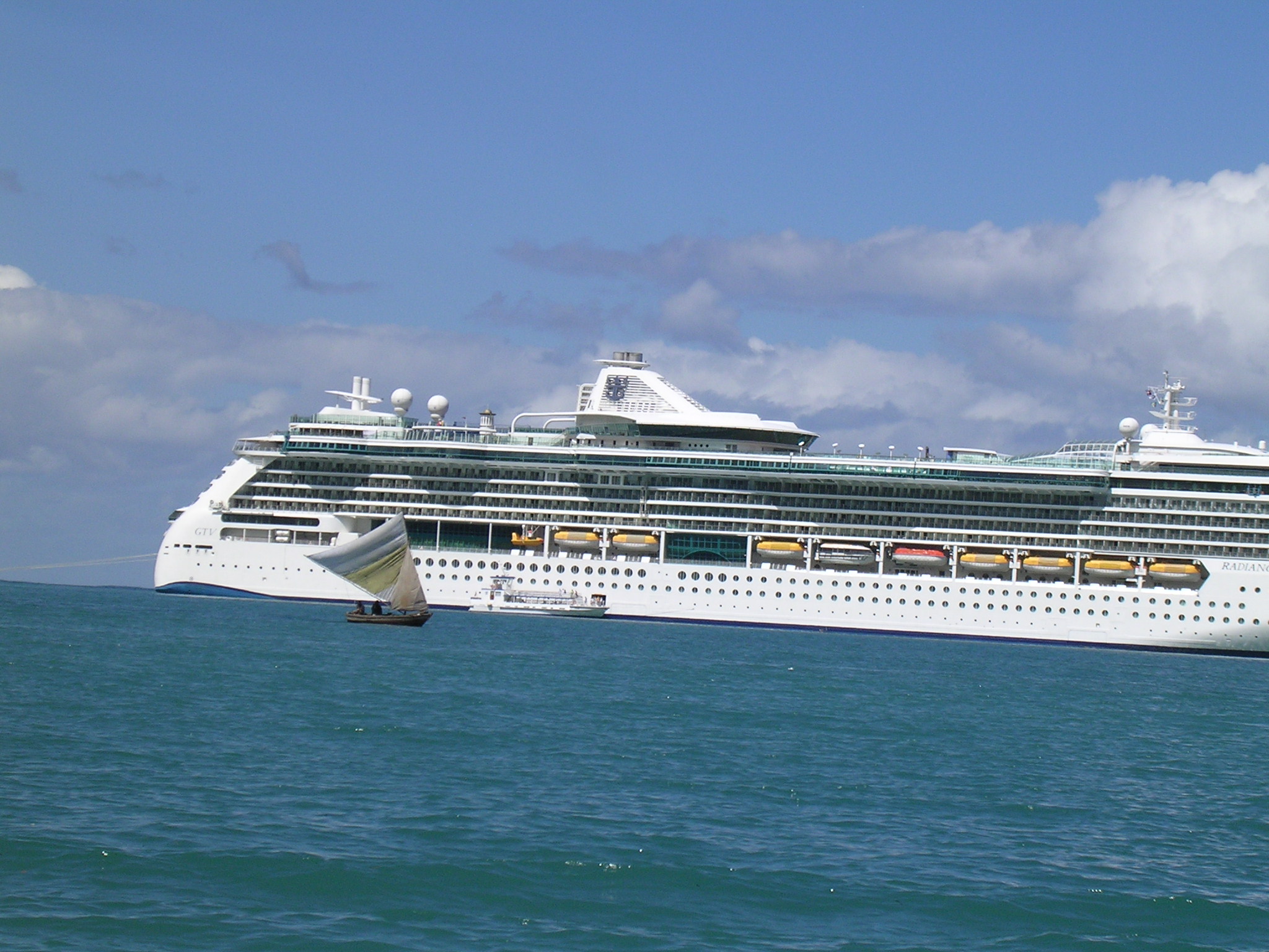 big cruise ship little sailboat Haiti Cap Haitian Labadee