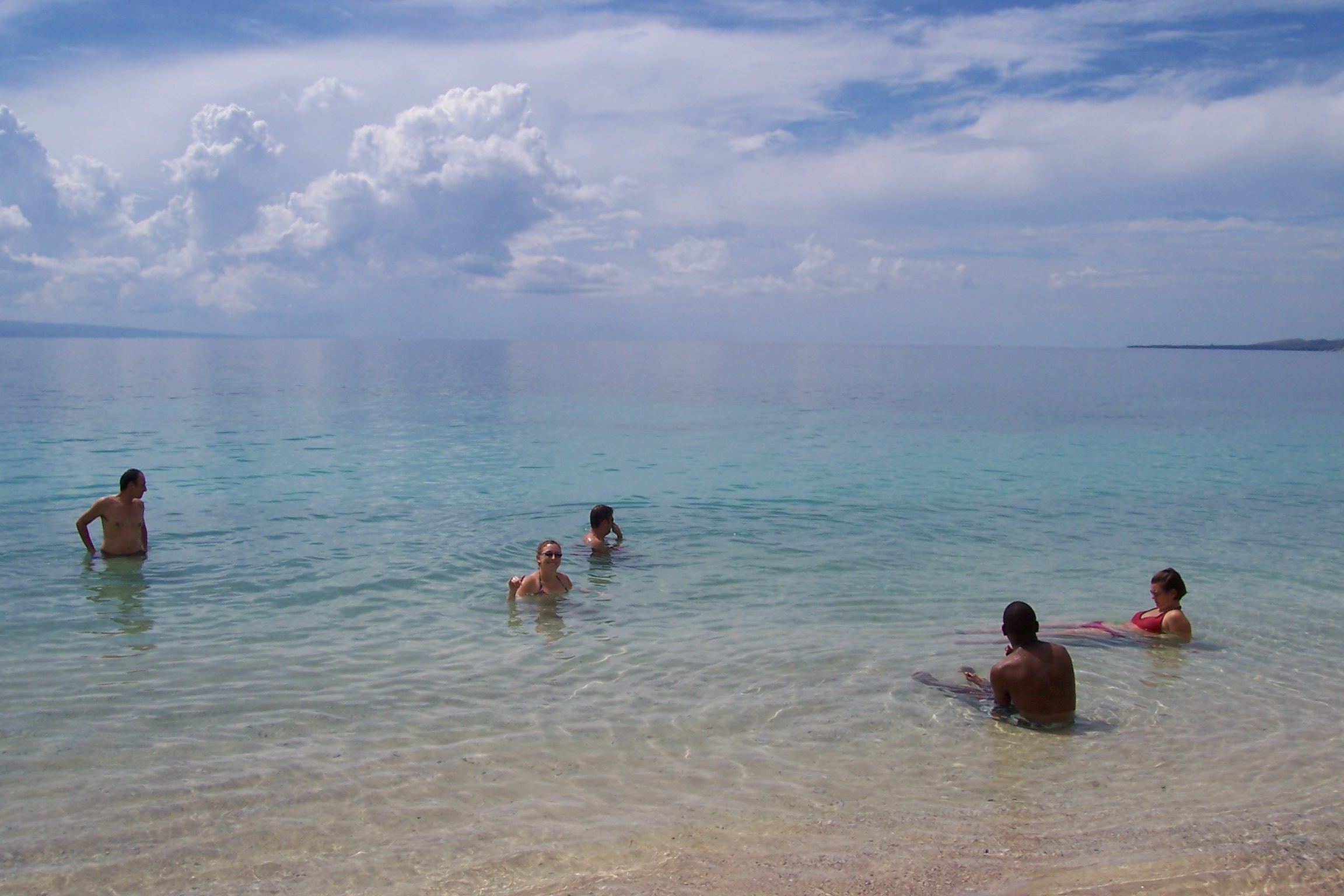 friends in the water at wahoo bay haiti