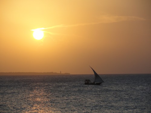 sunset and sailboat zanzibar boats