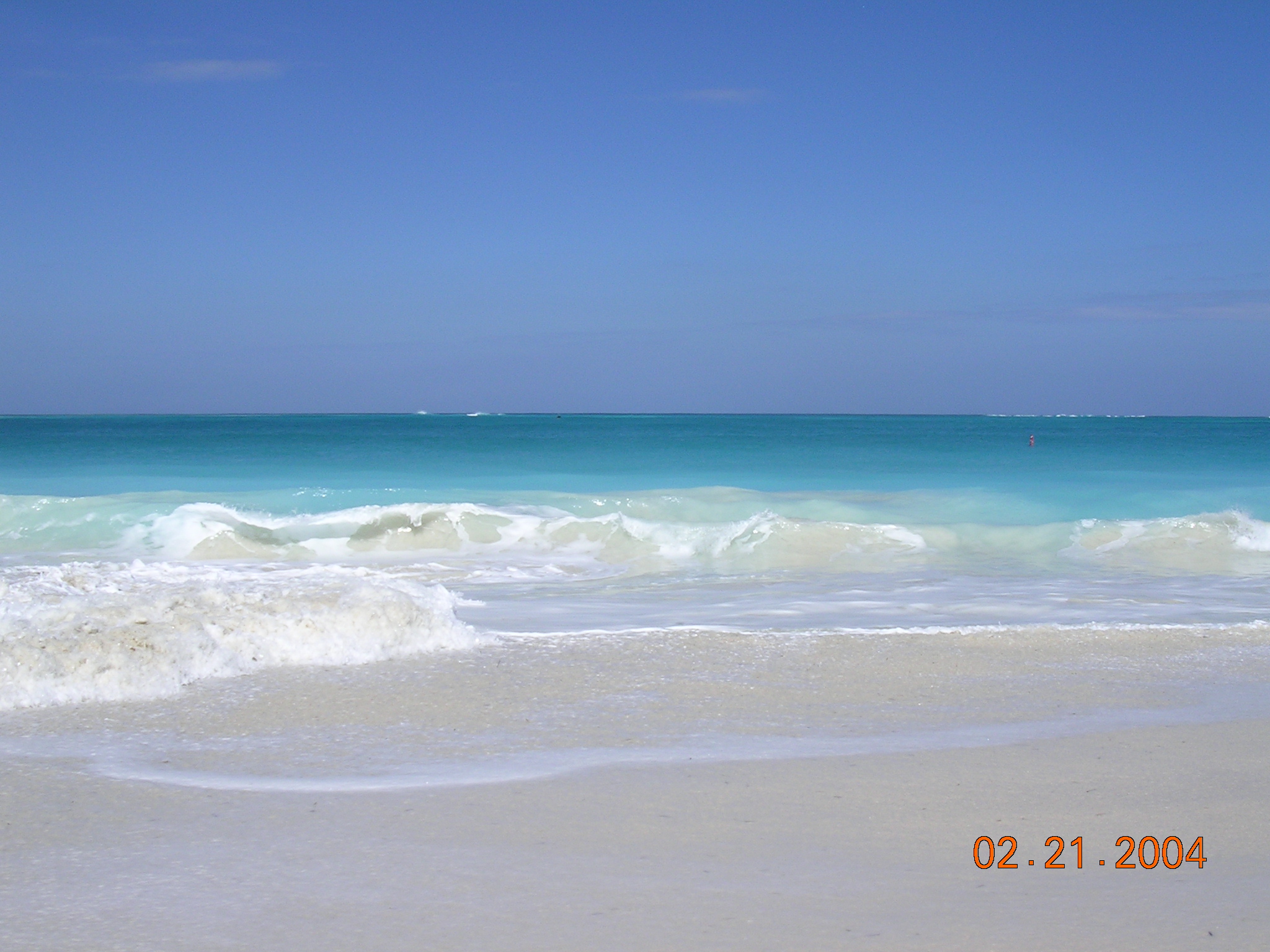 water and sand at turks and caicos beach