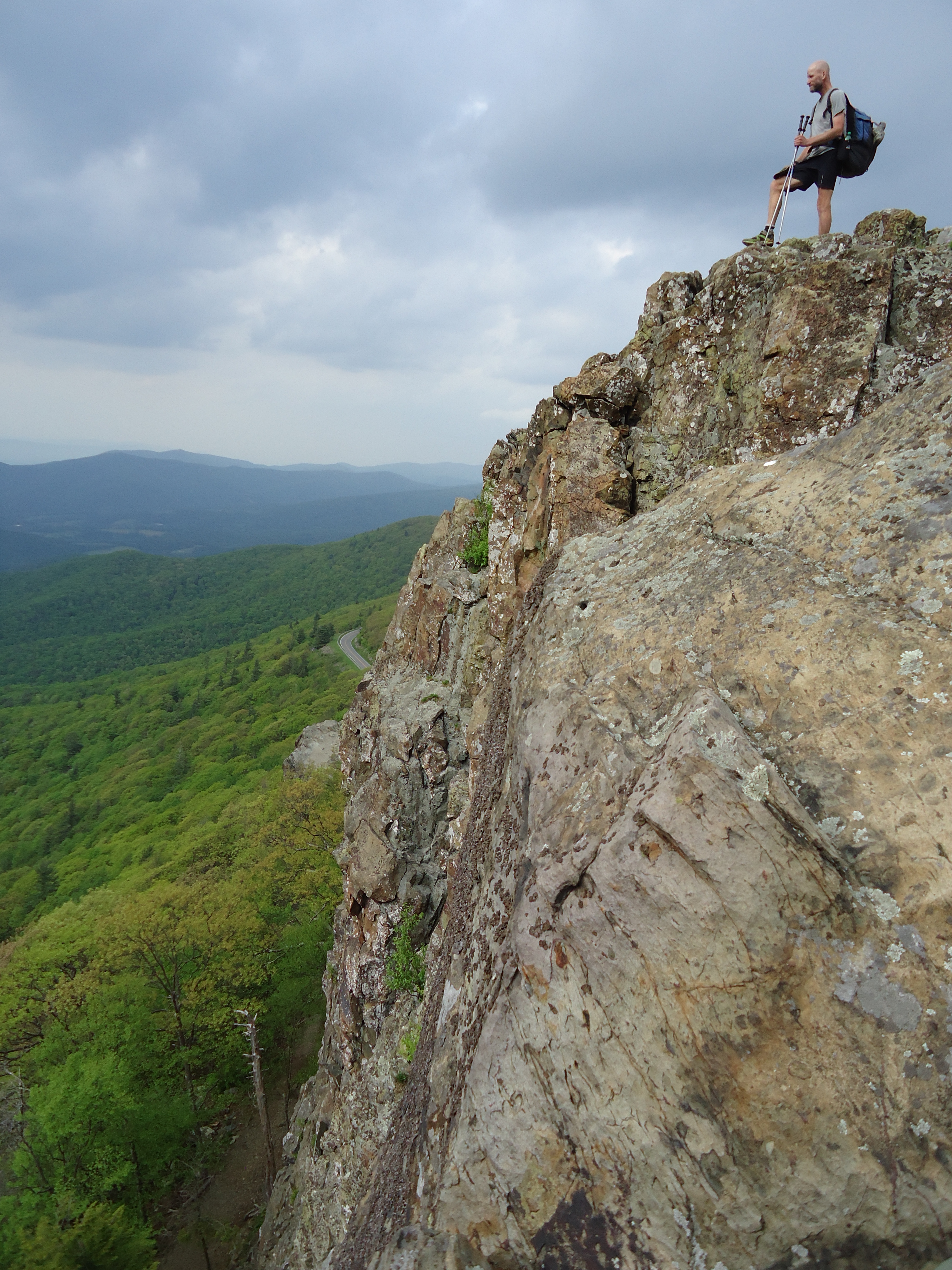 Hiker on rock outcropping Appalachian Trail Virginia