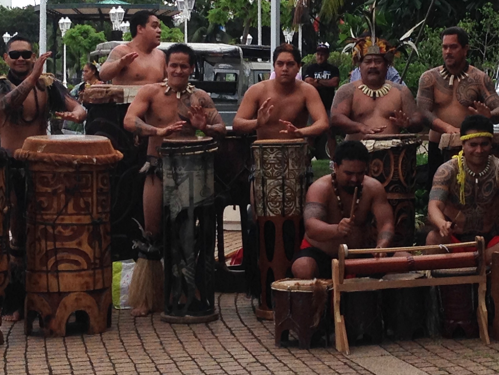 men playing tahitian instruments