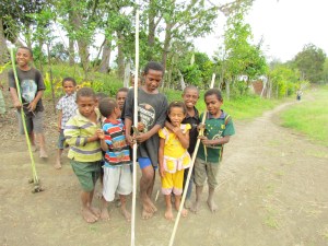 Papua New Guinea highlands village kids with homemade toy cars