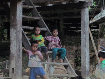 village kids Laos homestay stray bus