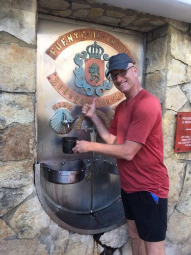 Filling up at a wine fountain, Camino Santiago