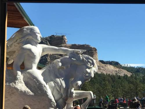 model and actual carving of Crazy Horse Memorial
