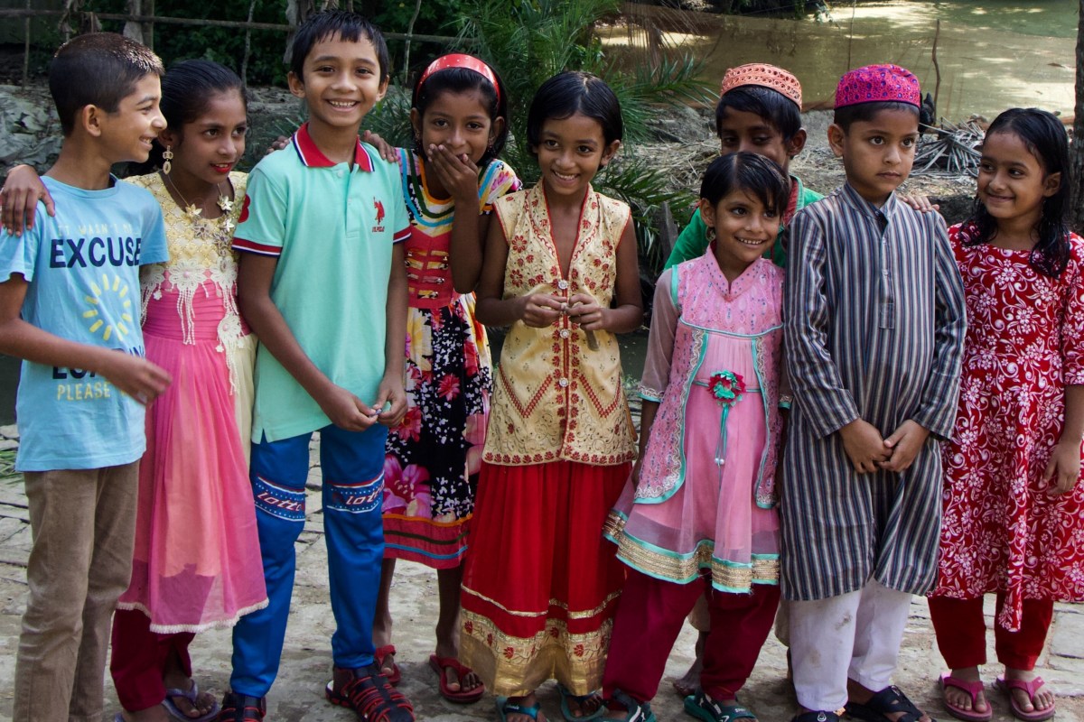 Bangladeshi children in colorful clothing standing
