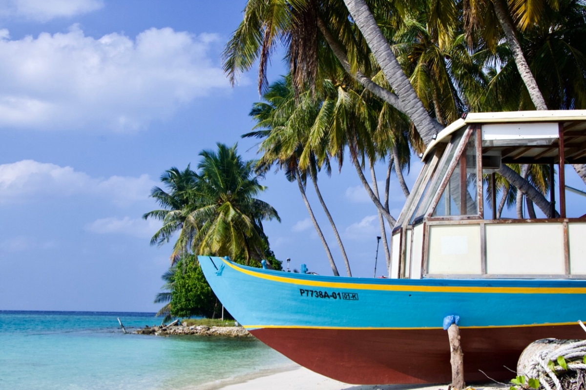 Maldives Thulusdhoo boat island water beach